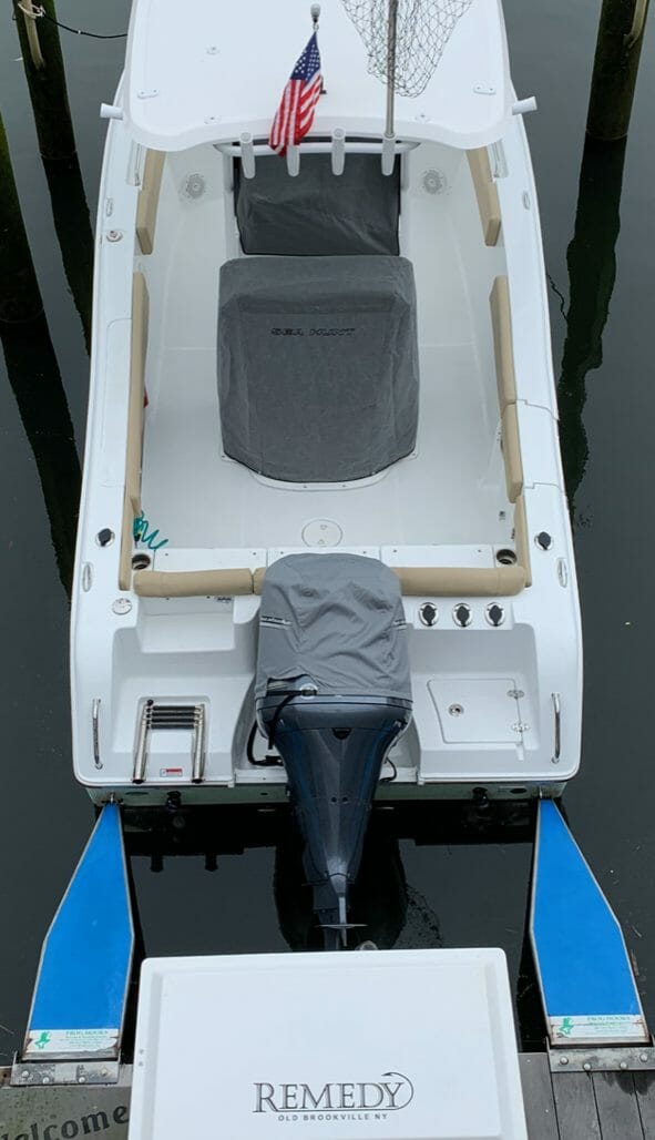 Boat docked with Frog Hooks